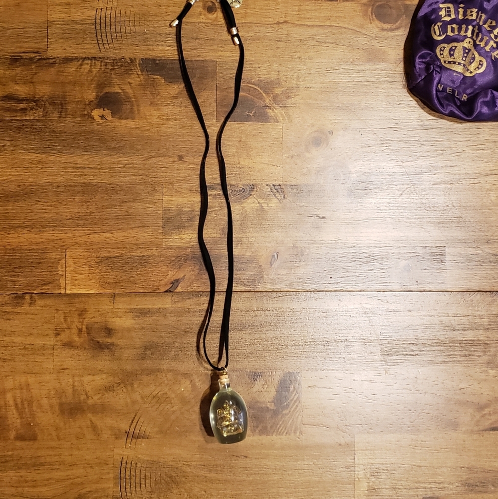 Disney Couture Pirates Ship in a Bottle Necklace